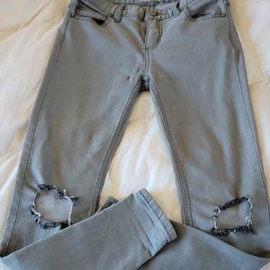 Free People Low Rise Frayed Hem Busted Knee Jeans